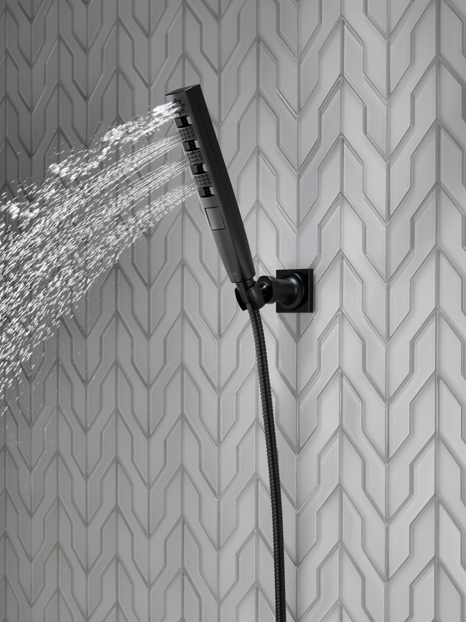 Delta Universal Showering Components: H2Okinetic® 4-Setting Wall Mount Hand Shower